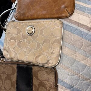3 Coach Signature Wristlet Pouch’s